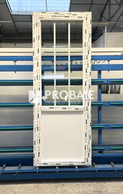 Porte de service avec croisillons